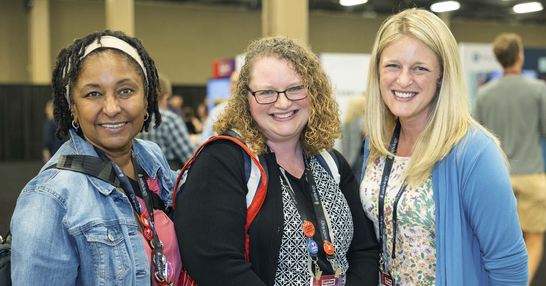 3 Attendees Smiling