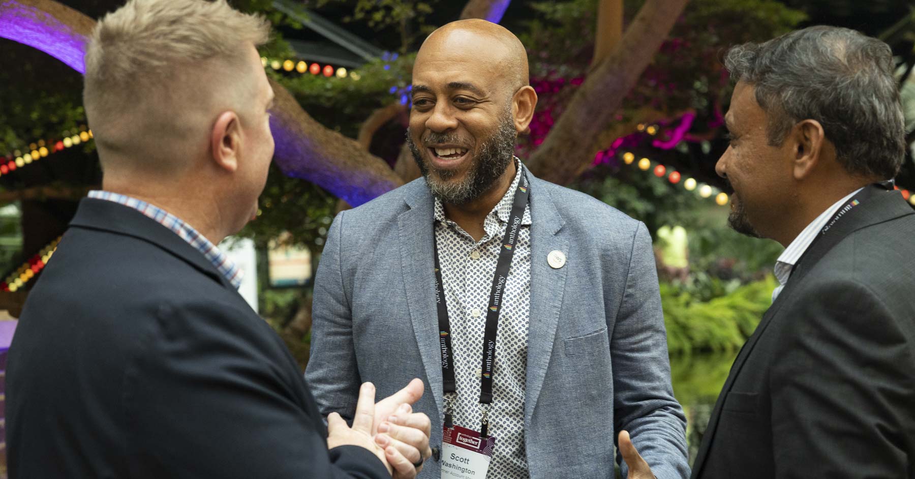 Three attendees networking